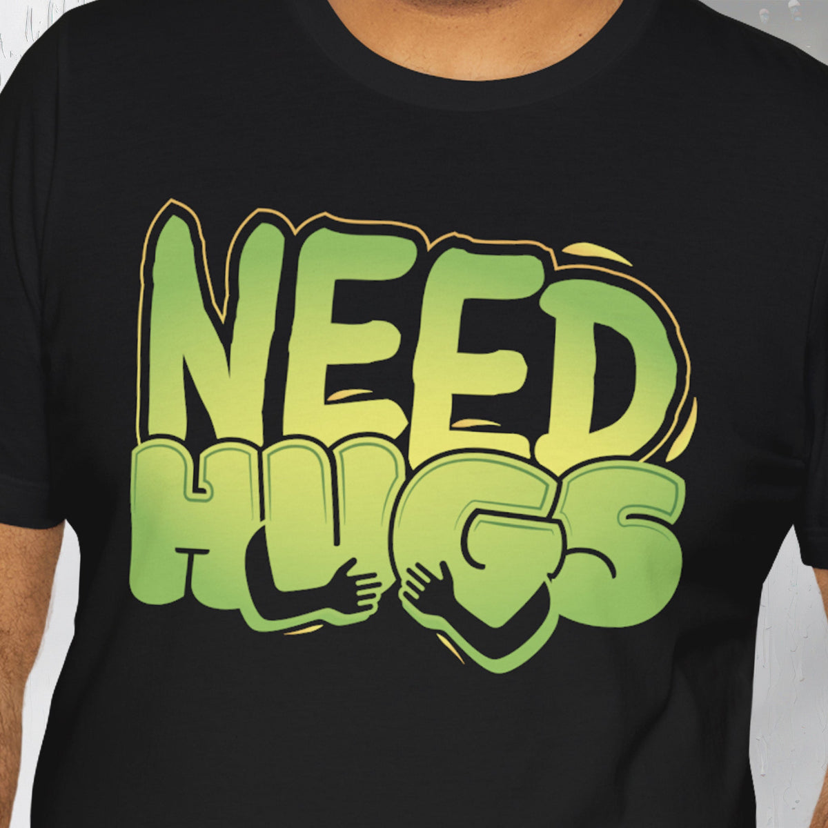Need Hugs t-shirt graphic – cozy emotional support design for comfort wear and mental health days | closeup