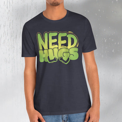 Need Hugs t-shirt graphic – cozy emotional support design for comfort wear and mental health days | model