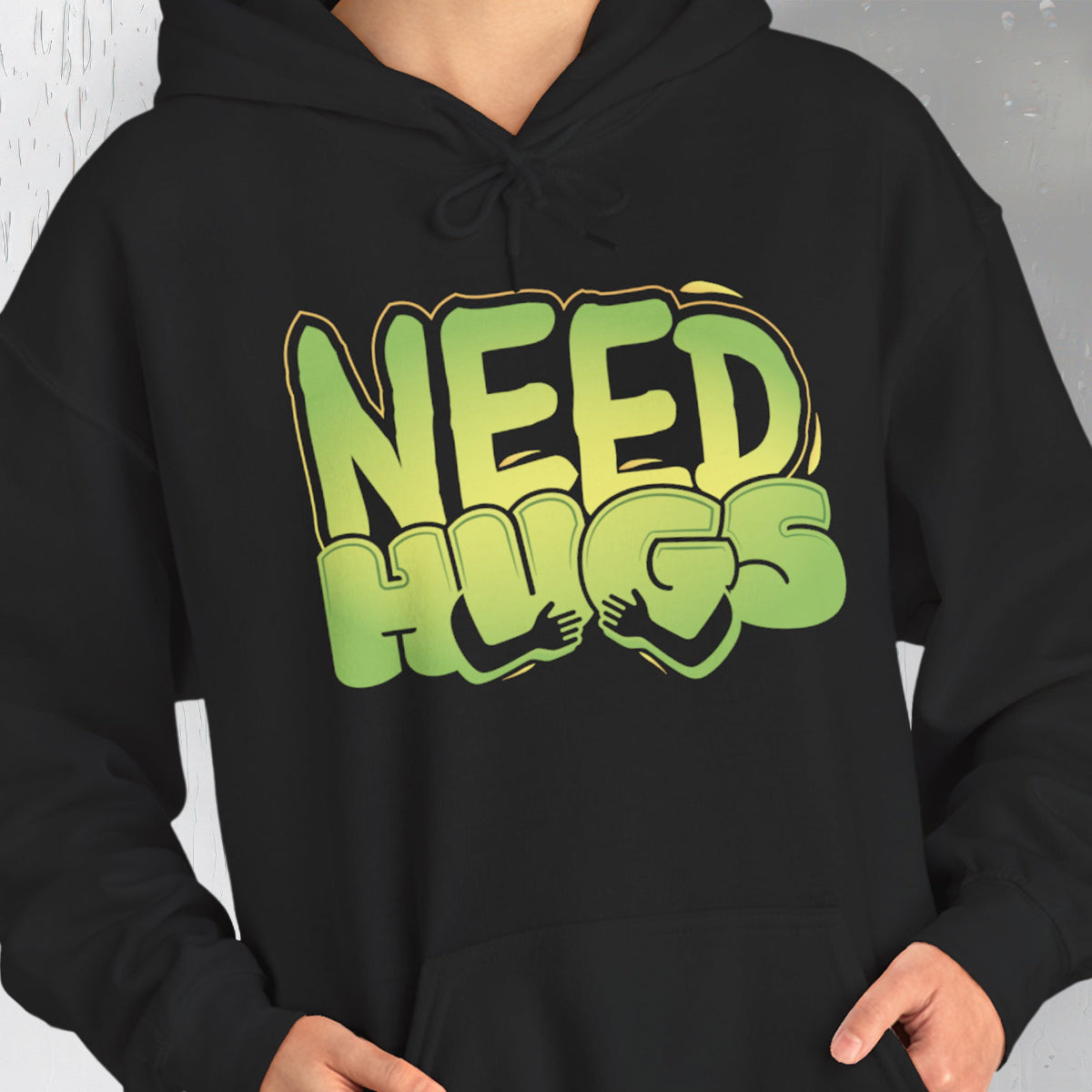 Need Hugs hoodie design – warm, comforting graphic for self-care and supportive gifting | closeup