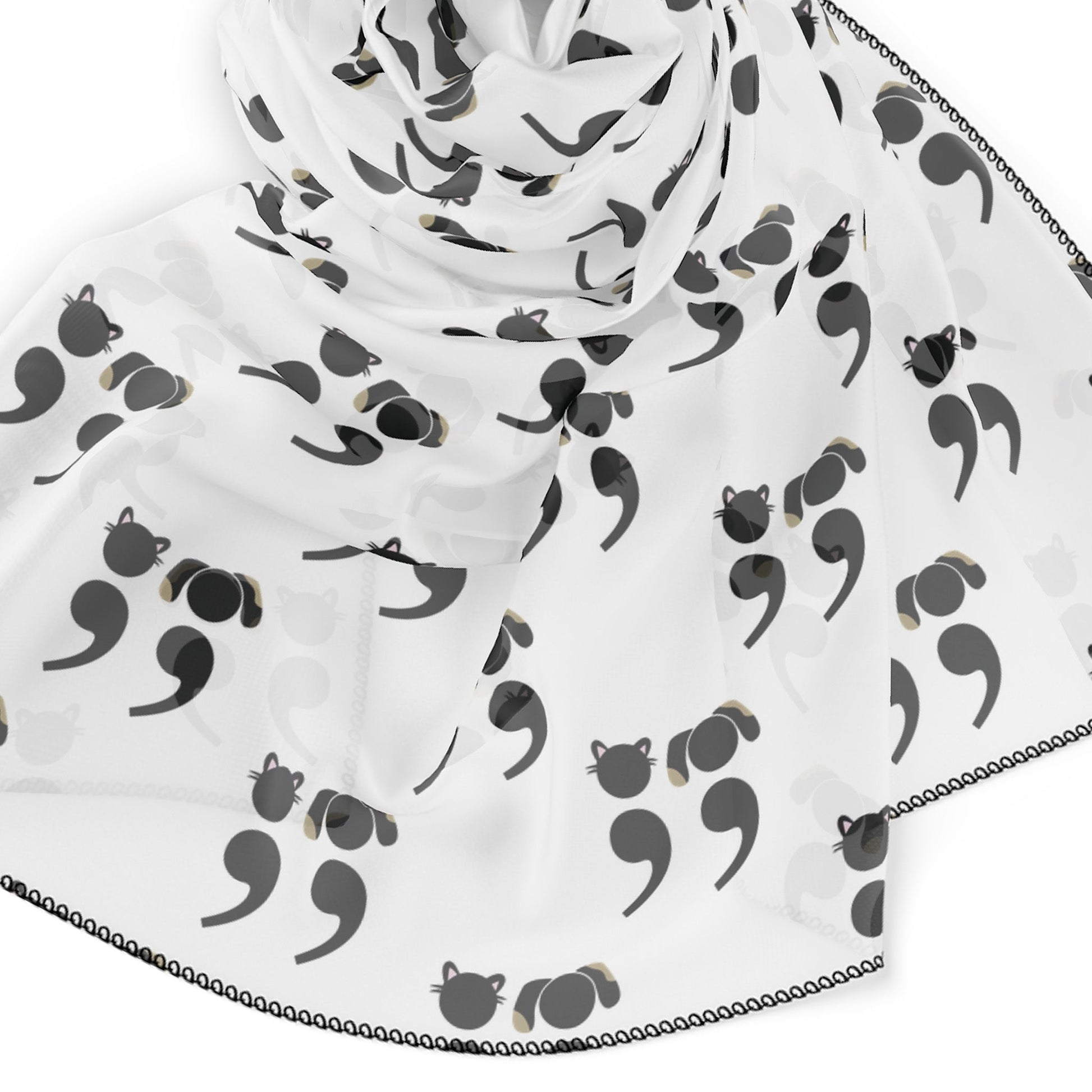 Black and white scarf featuring semicolon-style dog and cat faces in a minimalist repeating pattern – perfect for grammar nerds and pet lovers | closeup
